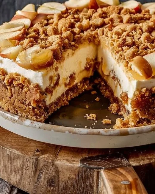 Delicious Apple Crumble Cheesecake topped with crunchy crumble topping