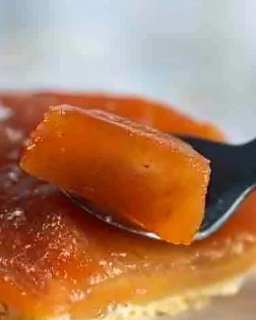 Apple Mille Feuille 2 A beautifully plated Apple Mille Feuille with layers of pastry and apple filling.