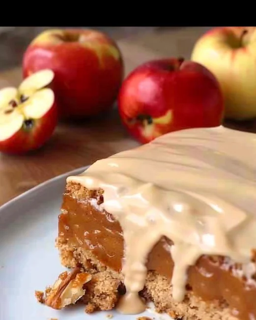Apple Spice Cake 2 Delicious homemade Apple Spice Cake topped with cinnamon and fresh apples.