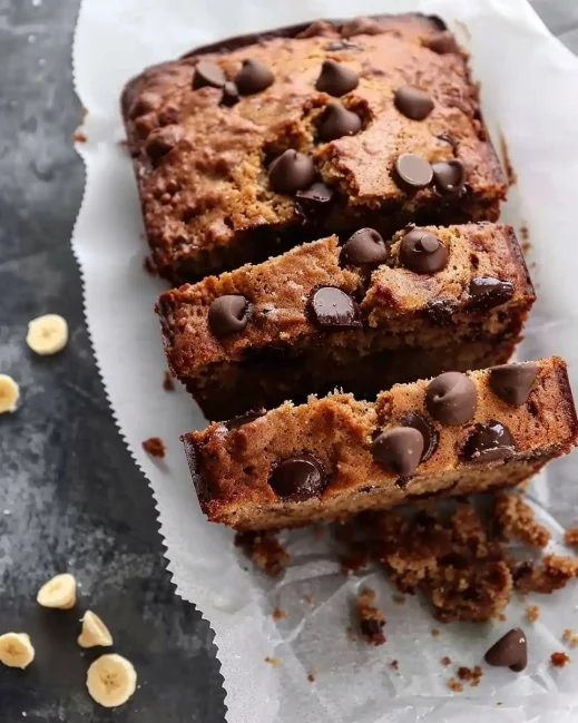 Freshly baked chocolate chip banana bread with chocolate chips on top