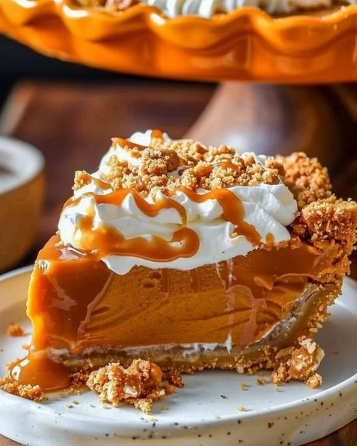 Milk Bar Hilly's Pumpkin Caramel Pie 2 Slice of Milk Bar Hilly's pumpkin caramel pie with whipped cream