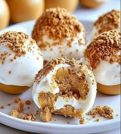 No Bake Pumpkin Cheesecake Balls 2 No Bake Pumpkin Cheesecake Balls ready to serve, a delicious fall dessert.