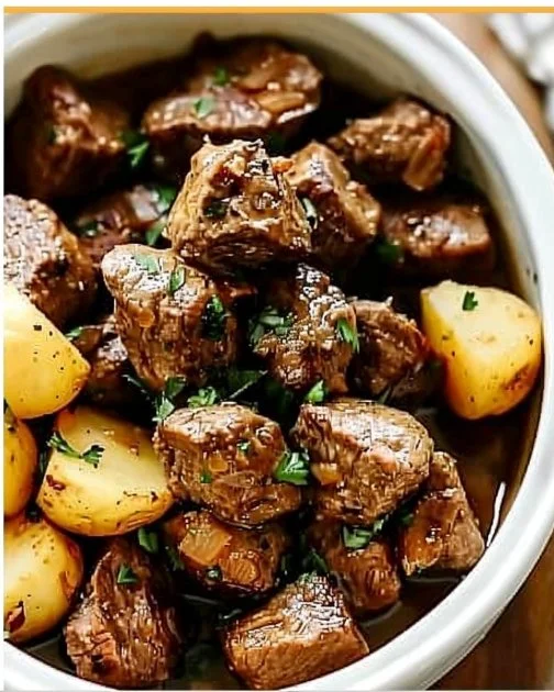 Crockpot Garlic Butter Beef Bites and Potatoes 2 Crockpot garlic butter beef bites served with tender potatoes