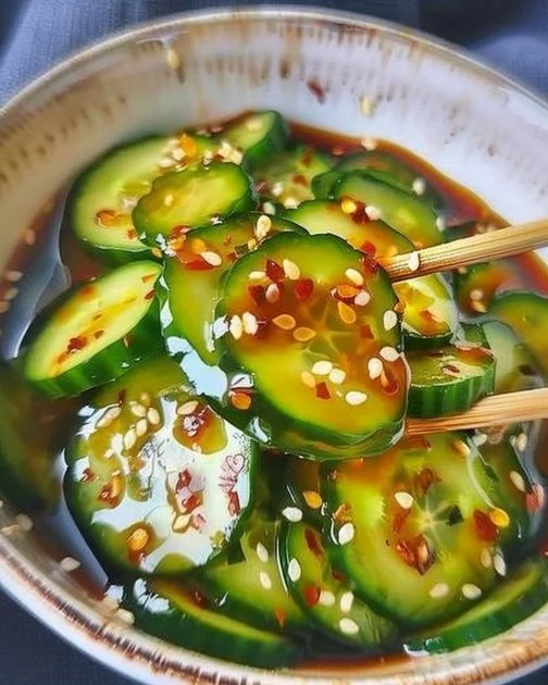 Easy Asian Cucumber Salad 2 A vibrant bowl of easy Asian cucumber salad with fresh vegetables and dressing