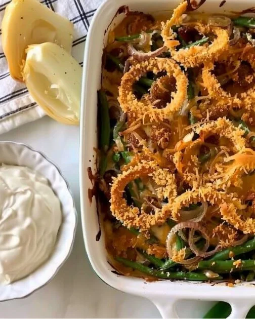 Green Bean Casserole 2 Delicious green bean casserole topped with crispy onions, perfect holiday side dish