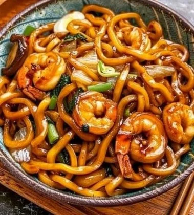 Delicious Yaki Udon noodles stir-fried with vegetables and sauce